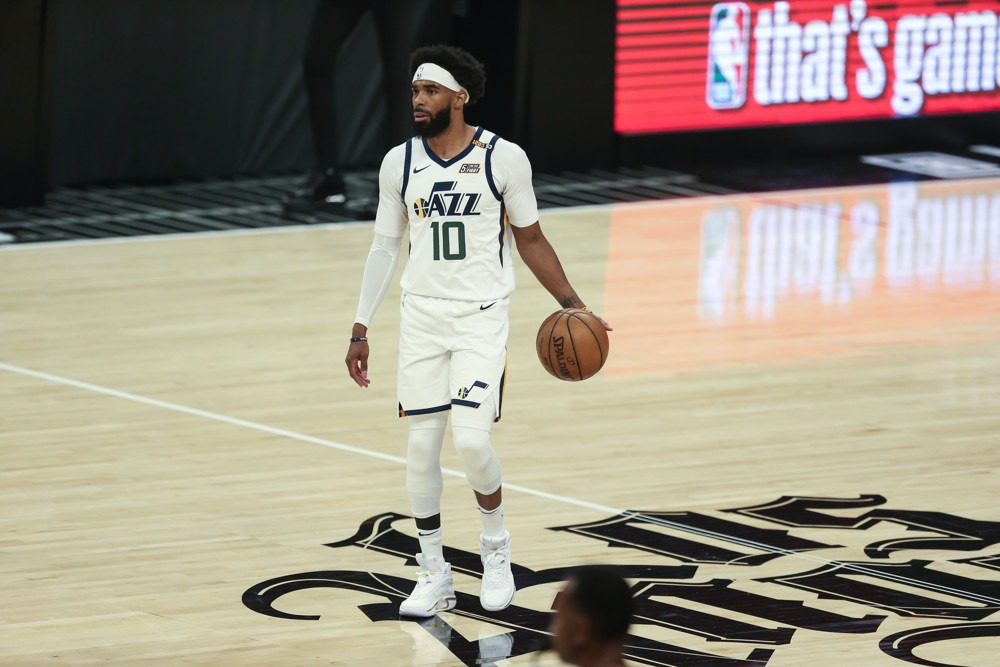 Mike Conley of the Utah Jazz heads up the floor